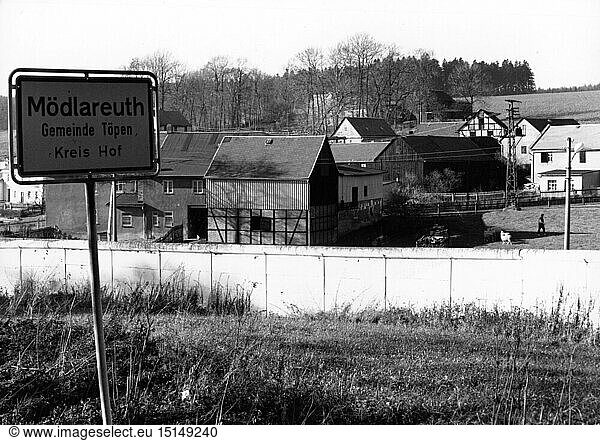 geography / travel  Germany  Germany  border  zonal border at Moedlareuth  west side  defensive wall  place-name sign  view towards East in the GDR  1980s