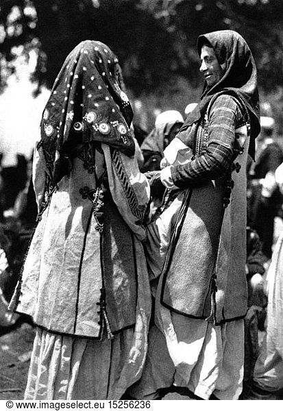geography / travel historic  Albania  people  two farmer's wifes at an Catholoc observance  Shen Ana (Saint Anna)  North Albania  Atlantis  number 10  1930  religion  religions  Christianity  ethnicity  ethnic  ethnical  ethnicities  half-length  half length  women  female  folklore  national costume  national costumes  Christian  Christians  Kingdom of Albania  the Balkans  Balkan Peninsula  Europe  20th century  1930s  farmer's wife  countrywoman  countrywomen  number  numbers  historic  historical