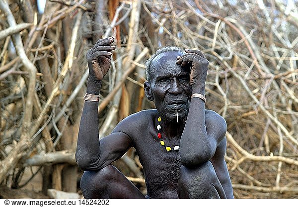 geography / travel  South Sudan  people  men  older Toposa man with lip jewellery  near Nyanyagachor