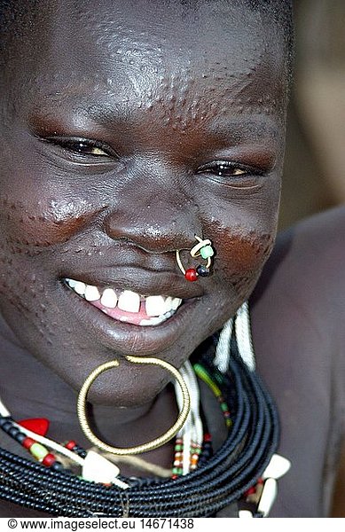 geography / travel  South Sudan  people  women  Toposa woman with nose jewellery  lip jewellery and necklace  portrait  near Nyanyagachor