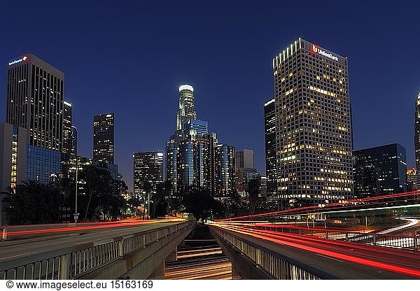 geography / travel  USA  California  Los Angeles  skyline Los Angeles and harbour Freeway (I-110) at night