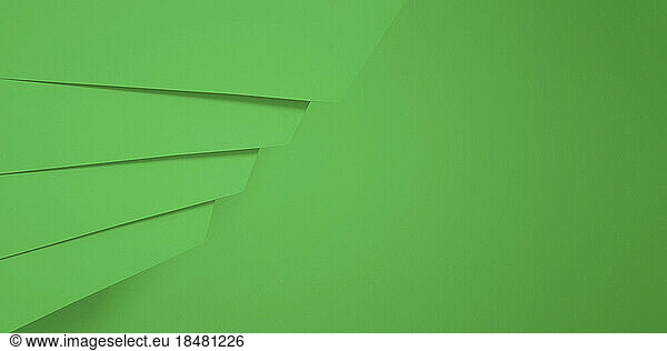 Geometric shapes on abstract green background