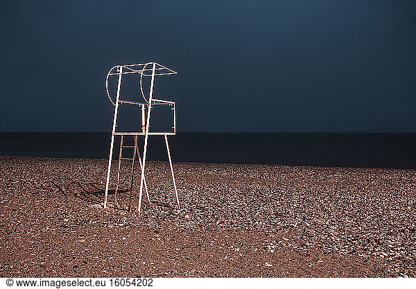 Georgia  Adjara  Batumi  Lifeguard chair on empty beach at night