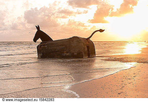 German bunker transformed into a sculpture of a mule at Blavand beach