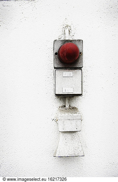 Germany  Alert button on housewall  close-up