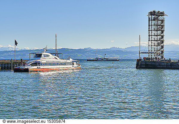 Germany  Baden-Wuerttemberg  Friedrichshafen  Port entrance with viewing tower  catamaran  steam boat Hohentwiel