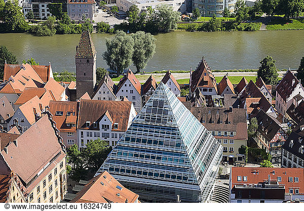 Germany  Baden-Wuerttemberg  Ulm  glass pyramide with central library  Danube river and tower Metzgerturm