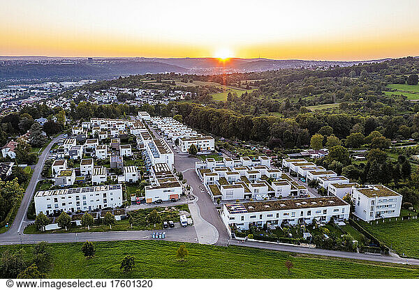 Germany  Baden-Wurttemberg  Esslingen am Neckar  Aerial view of new development area Sonnensiedlung Egert at sunset