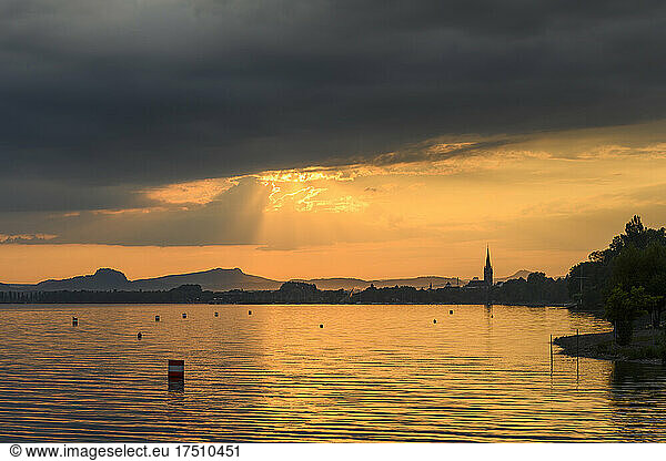 Germany  Baden-Wurttemberg  Radolfzell  Cloudy sky over Lake Constance at moody sunset