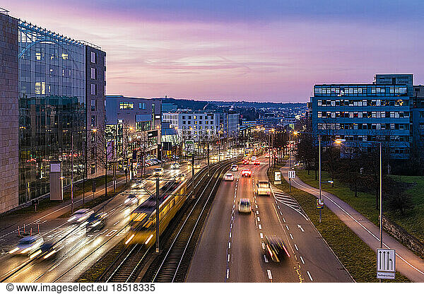 Germany  Baden-Wurttemberg  Stuttgart  Blurred motion of traffic on Bundesstrasse 27 at dusk