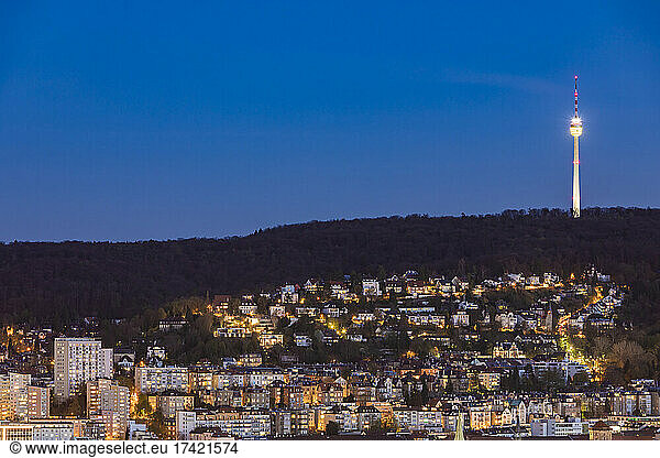 Germany  Baden-Wurttemberg  Stuttgart  Clear sky over city suburb at dusk with television tower in background