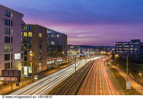Germany  Baden-Wurttemberg  Stuttgart  Vehicle light trails on Bundesstrasse 27 at dusk