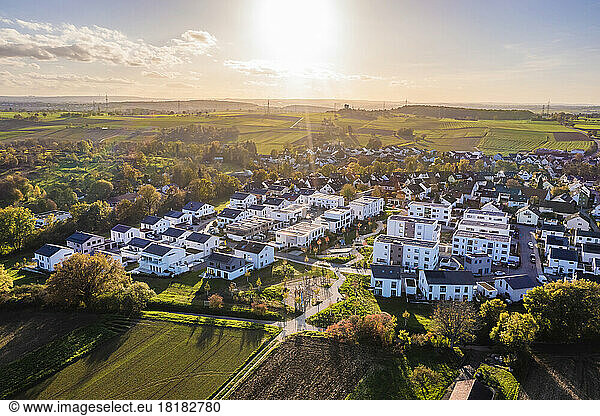 Germany  Baden-Wurttemberg  Waiblingen  Aerial view of modern energy efficient suburb at autumn sunset