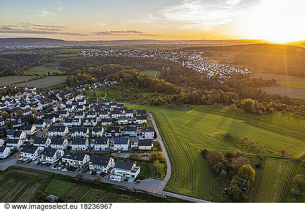 Germany  Baden-Wurttemberg  Waiblingen  Aerial view of suburban houses in new modern development area at sunset