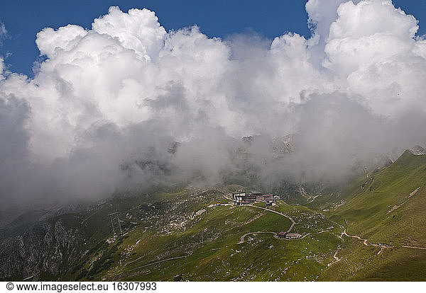 Germany  Bavaria  Allgaeu Alps  mountain station Hoefatsblick  behind the clouds Nebelhorn and Hindelang via ferrata