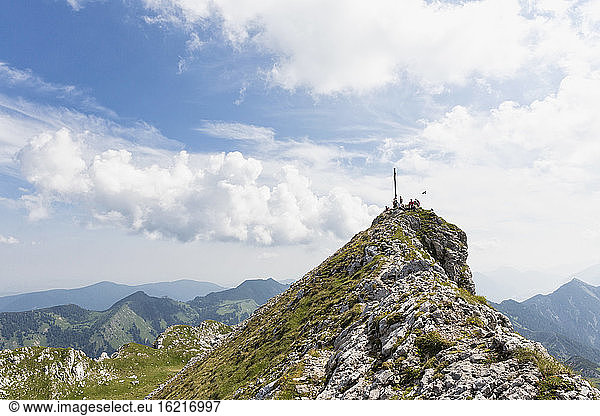 Germany  Bavaria  Ammergau Alps  View of hiker on ridge walk to Ammergauer Hochplatte