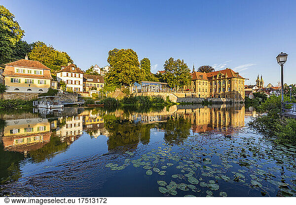 Germany  Bavaria  Bamberg  Villa Concordia and surrounding houses reflecting in river Regnitz