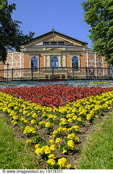 Germany  Bavaria  Bayreuth  Red and yellow flowers blooming in garden of Bayreuth Festival Theatre