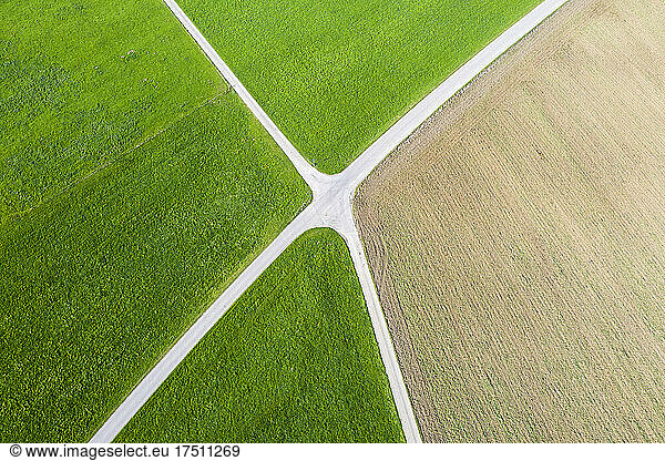 Germany  Bavaria  Bichl  Aerial view of countryside crossroad in summer