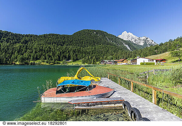 Germany  Bavaria  Boats at jetty of Lautersee lake in summer