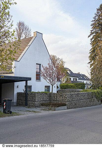 Germany  Bavaria  Exterior of modern single-family house with stone wall