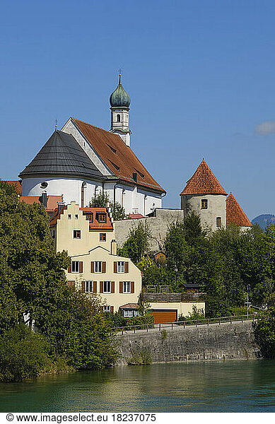 Germany  Bavaria  Fussen  St. Stephan church on bank of Lech river