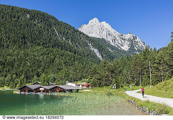 Germany  Bavaria  Lautersee in summer with boathouses in background