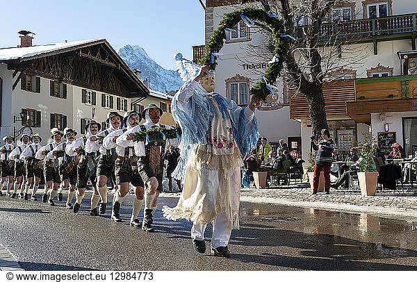 Germany  Bavaria  Mittenwald  traditional carnival procession  'Unsinniger Donnerstag'  bell stirrers