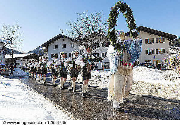 Germany  Bavaria  Mittenwald  traditional carnival procession  'Unsinniger Donnerstag'  bell stirrers
