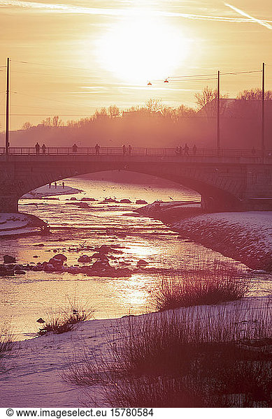 Germany  Bavaria  Munich  Arch bridge at moody winter sunset