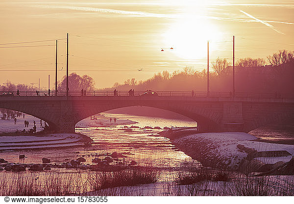 Germany  Bavaria  Munich  Arch bridge at moody winter sunset