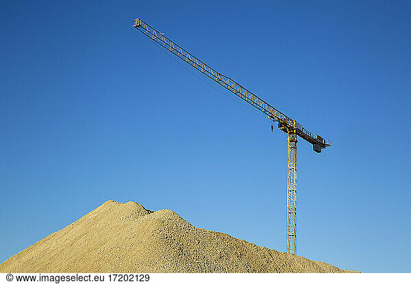 Germany  Bavaria  Munich  Construction crane against blue sky