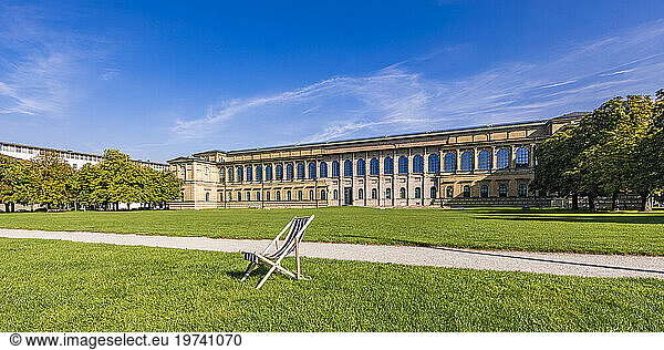 Germany  Bavaria  Munich  Empty deck chair in front of Alte Pinakothek museum