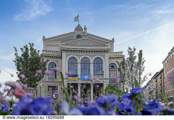 Germany  Bavaria  Munich  Facade of Gartnerplatztheater opera house with flowerbed in foreground