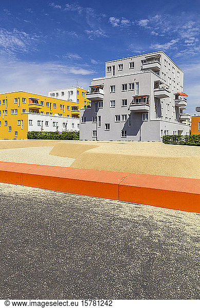 Germany  Bavaria  Munich  Sandy playground in front of residential buildings