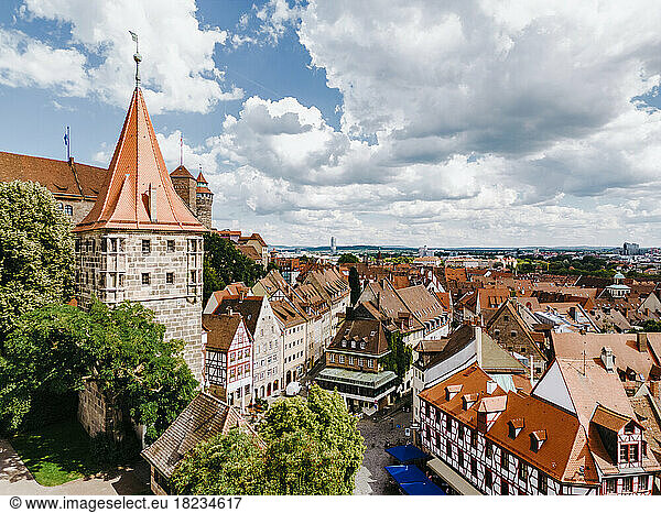 Germany  Bavaria  Nuremberg  Aerial view of clouds over Tiergartnertorturm tower and surrounding old town houses