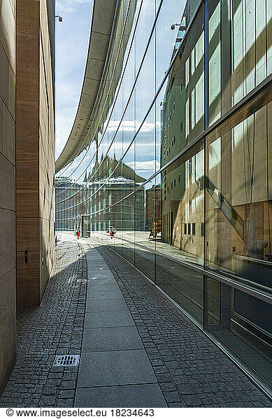 Germany  Bavaria  Nuremberg  Alley along glass walls of Nuremberg State Museum of Art and Design