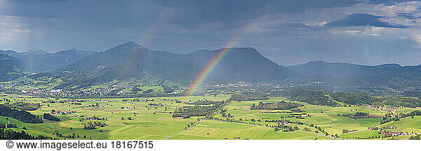 Germany  Bavaria  Panoramic view of double rainbow over Illertal