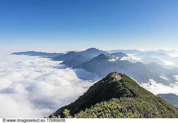 Germany  Bavaria  Peak of Herzogstand mountain with thick fog in background