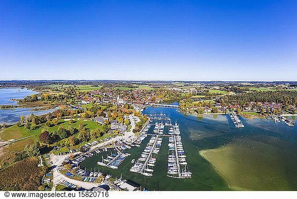 Germany  Bavaria  Seeon-Seebruck  Aerial view of boats moored in harbor of lakeshore town