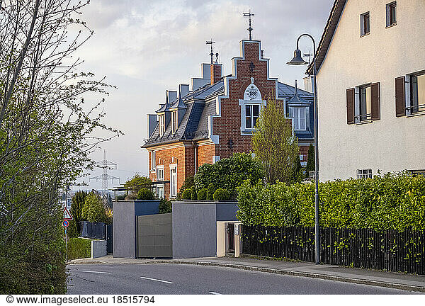 Germany  Bavaria  Street in front of modern suburban brick house