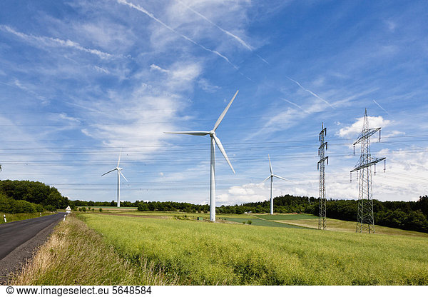 Germany  Bavaria  View of wind turbine and electricity pylon