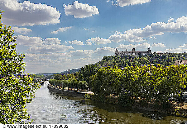 Germany  Bavaria  Wurzburg  Clouds over River Main with Marienberg Fortress in background