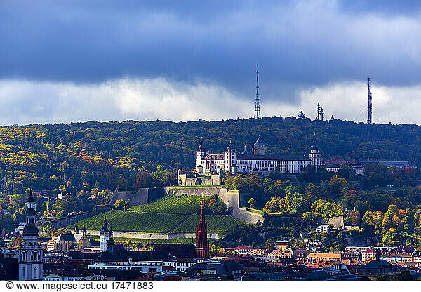 Germany  Bavaria  Wurzburg  Cloudy sky over Marienberg Fortress in autumn