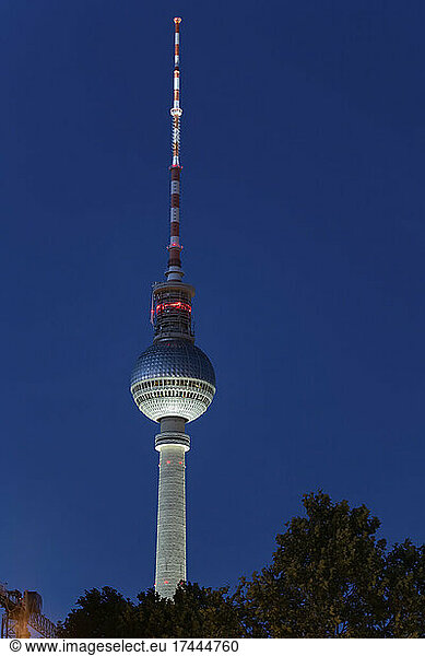 Germany  Berlin  Berlin Television Tower standing against clear sky at night