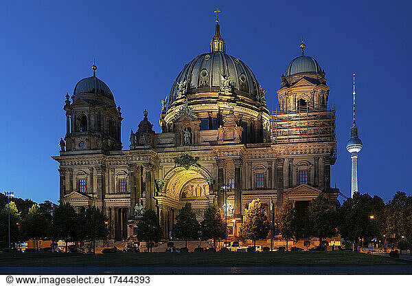 Germany  Berlin  Facade of Berlin Cathedral at night with Berlin Television Tower in background