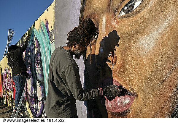 Germany  Berlin  13. 03. 2022  Mauerpark  graffiti wall  graffiti artist Eme Freethinker at work  Europe