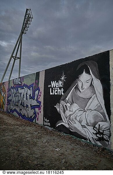 Germany  Berlin  20. 12. 2020  Mauerpark  Graffiti Wall  Madonna with Child  A Light to the World  by graffiti artist Tabor Larsen  Europe