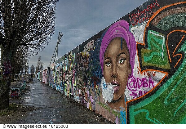 Germany  Berlin  09. 04. 2022  Mauerpark  graffiti wall  work by Dominican graffiti artist Eme Freethinker  Head of a Caribbean Woman  Europe