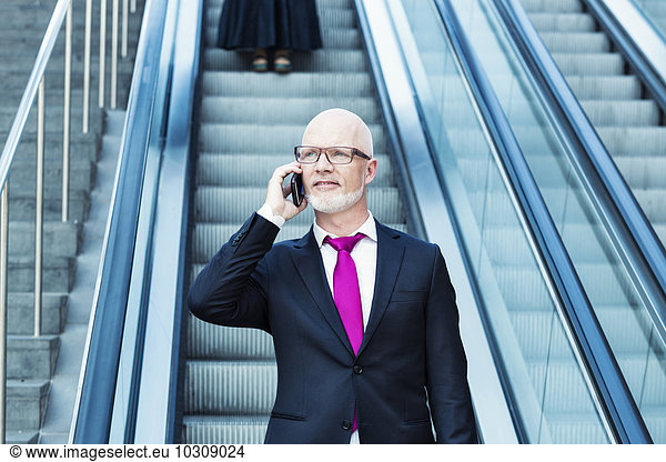 Germany  Berlin  Potsdam Square  business man with mobile phone